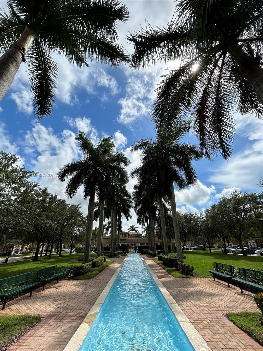 Cobblestone Pembroke Pines, FL 33027 - Photo 16 of 16 a view of a yard with palm trees