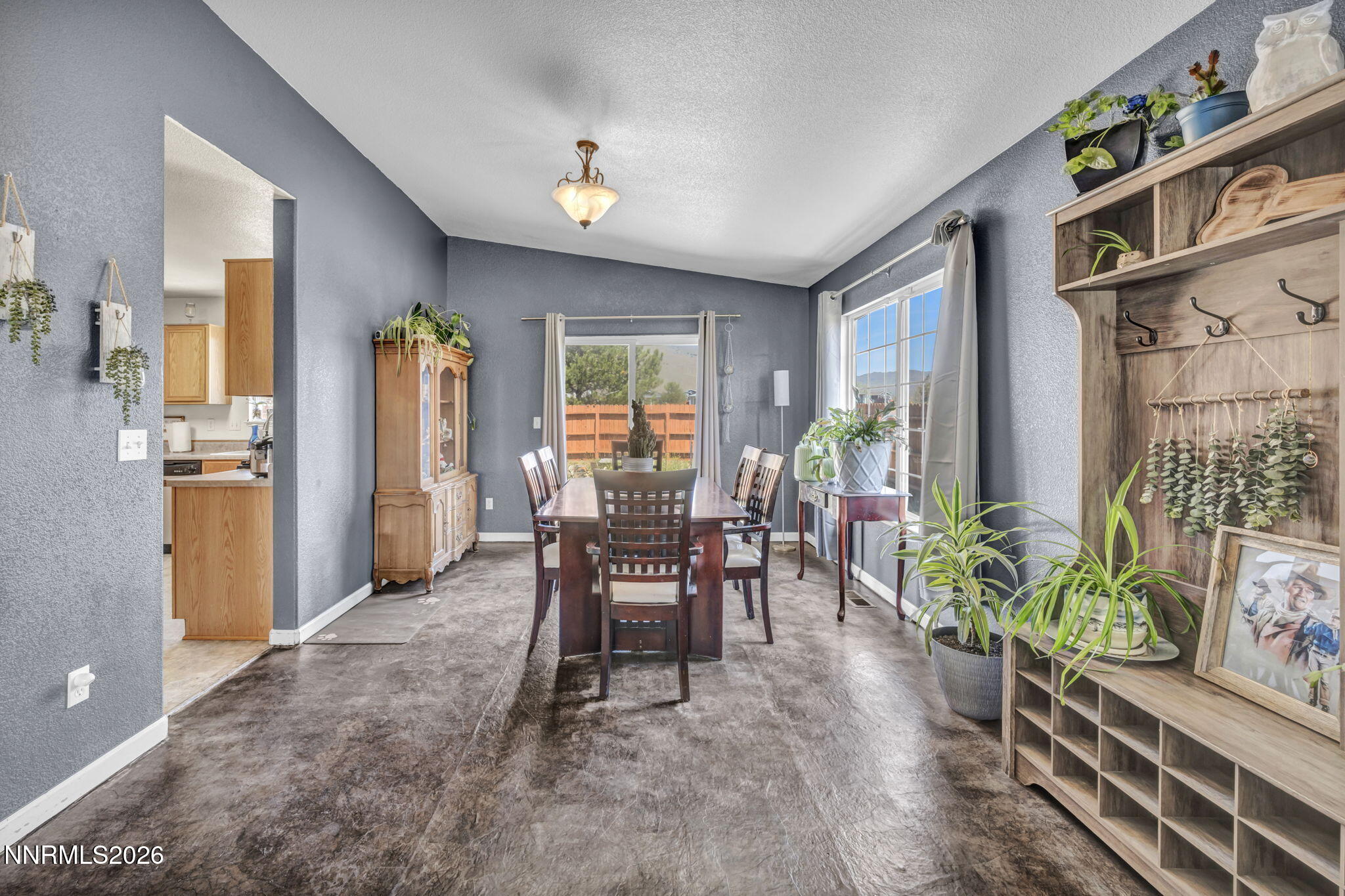 17615 Baileyville Court Reno, NV 89508 - Photo 4 of 19 a dining room with furniture and window