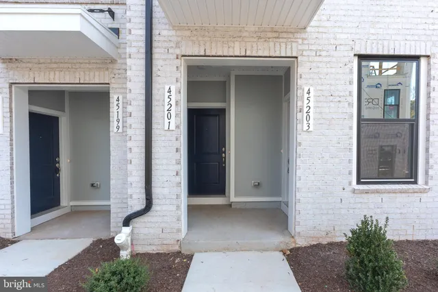 a front view of a house with a entrance