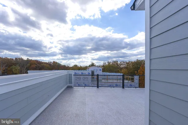a view of outdoor space with wooden fence