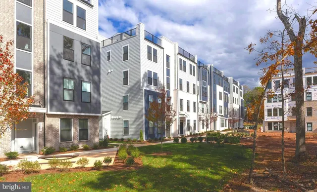 a city street lined with tall buildings