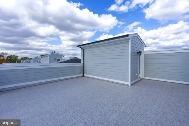 a view of backyard and garage