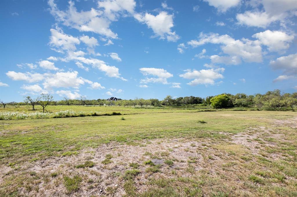 601 Gin Road Ennis, TX 75119 - Photo 29 of 33 a view of an ocean and beach