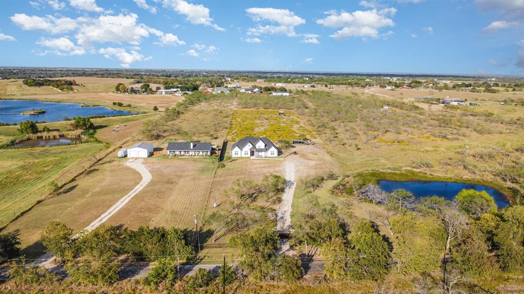 601 Gin Road Ennis, TX 75119 - Photo 31 of 33 a view of an ocean and beach
