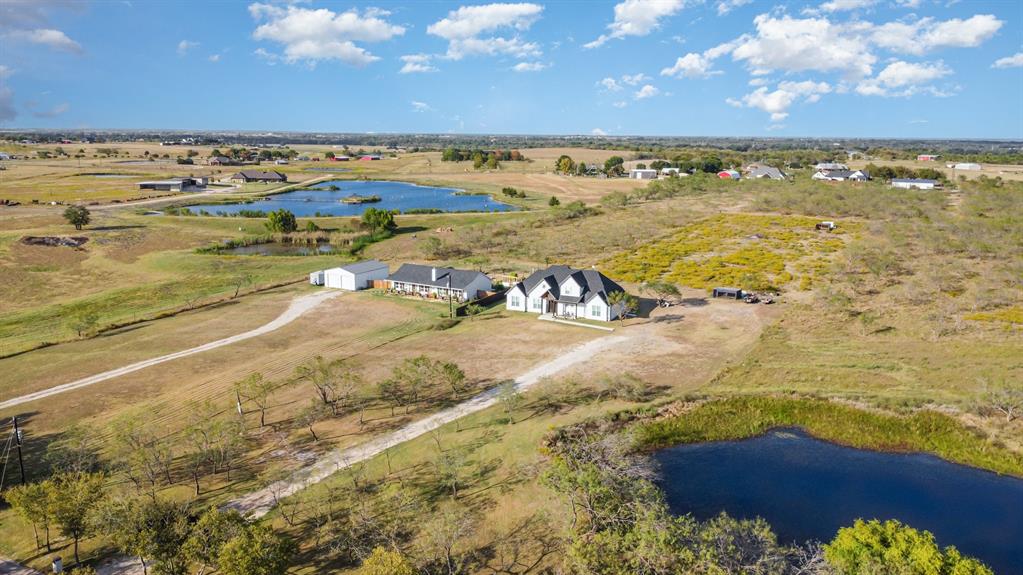 601 Gin Road Ennis, TX 75119 - Photo 32 of 33 a view of an ocean and beach