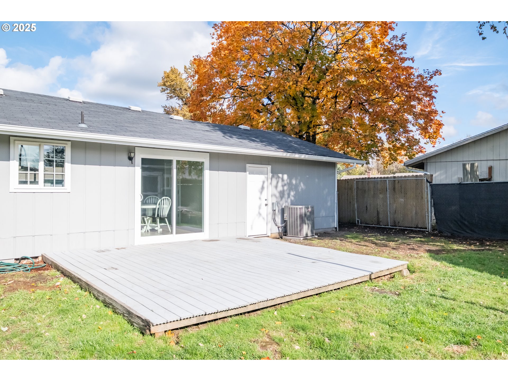 562 Elm Street Jefferson, OR 97352 - Photo 13 of 16 a house with trees in the background