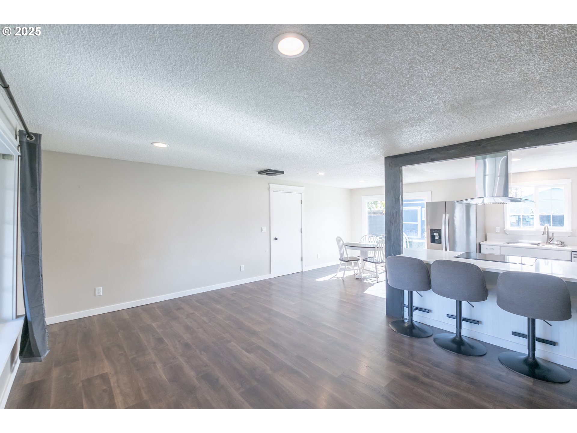 562 Elm Street Jefferson, OR 97352 - Photo 2 of 16 a view of a livingroom with furniture window and wooden floor
