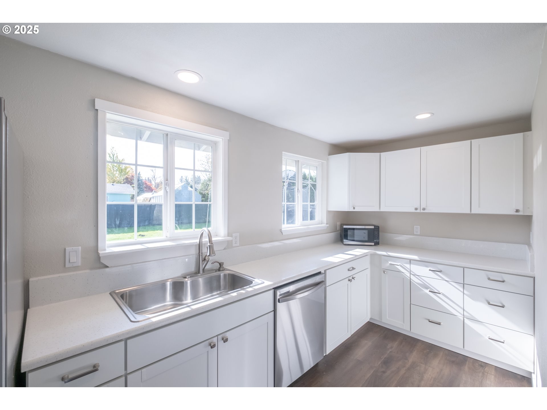 562 Elm Street Jefferson, OR 97352 - Photo 5 of 16 a kitchen with a sink stove and cabinets