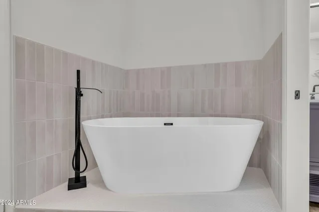 a bathroom with a bathtub