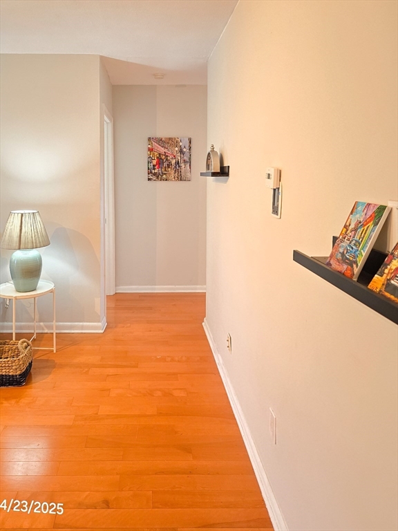 20 Westgate Road, Unit 6 Boston, MA 02467 - Photo 18 of 25 a view of a room with wooden floor