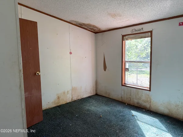 an empty room with windows