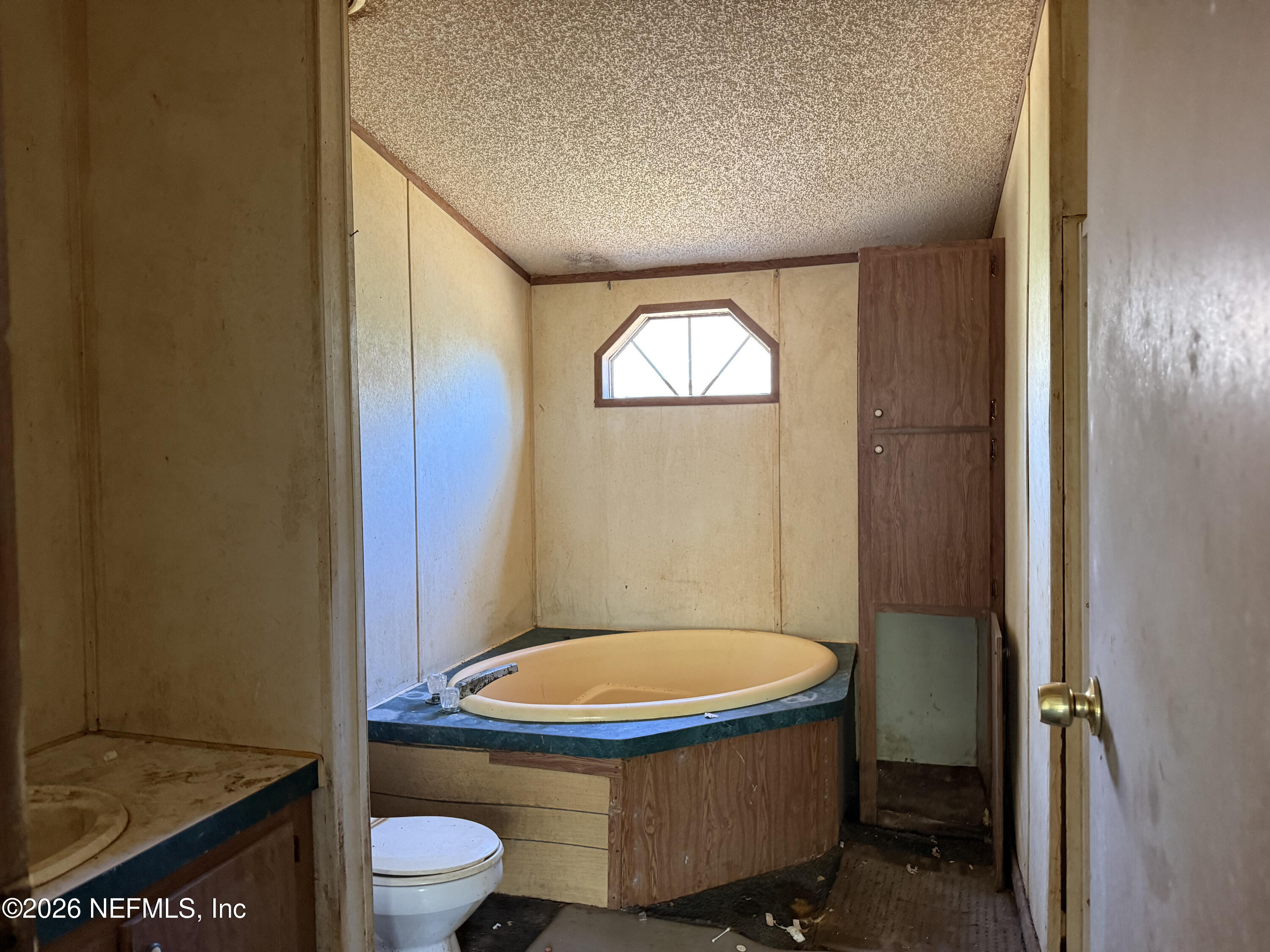 203 Quail Hollow Road Satsuma, FL 32189 - Photo 15 of 15 a bathroom with a toilet and a sink