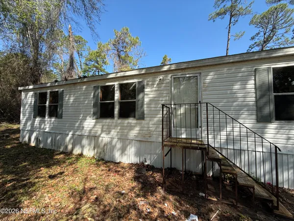 a view of a house with a balcony
