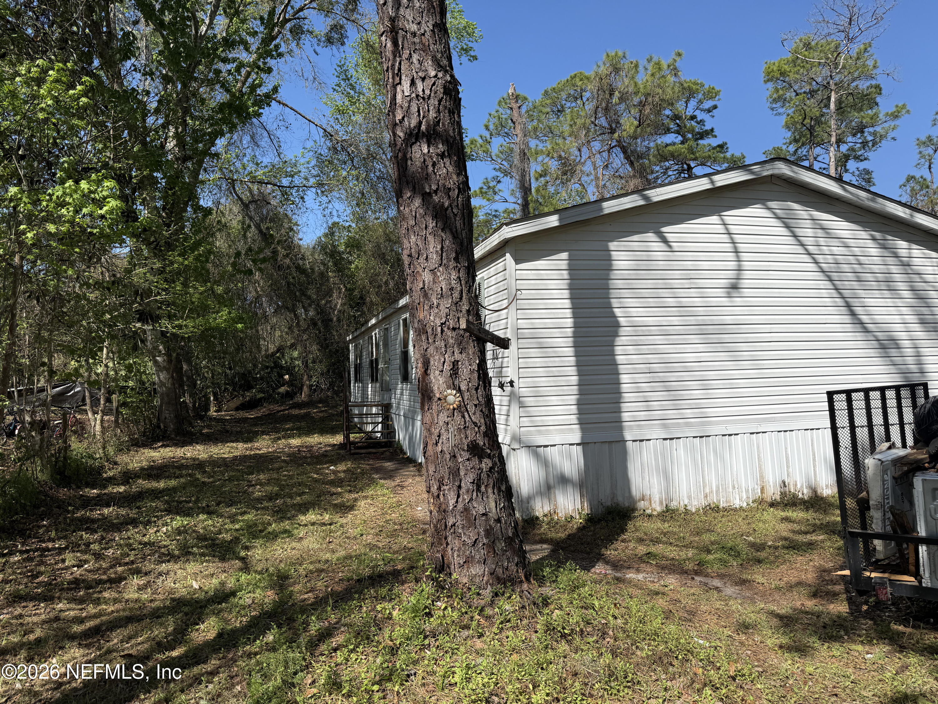 203 Quail Hollow Road Satsuma, FL 32189 - Photo 7 of 15 a view of a house with a yard