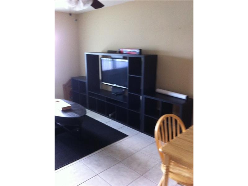 1350 East Sample Road, Unit 309A Pompano Beach, FL 33064 - Photo 4 of 7 Exterior Front