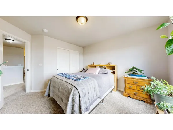 a en suite bathroom with a sink and a bed