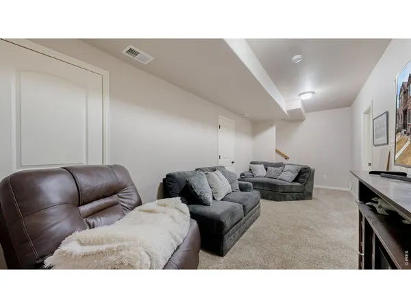 a bedroom with a bed and furniture