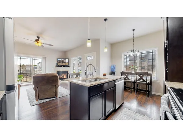 a living room with a bed furniture and a window