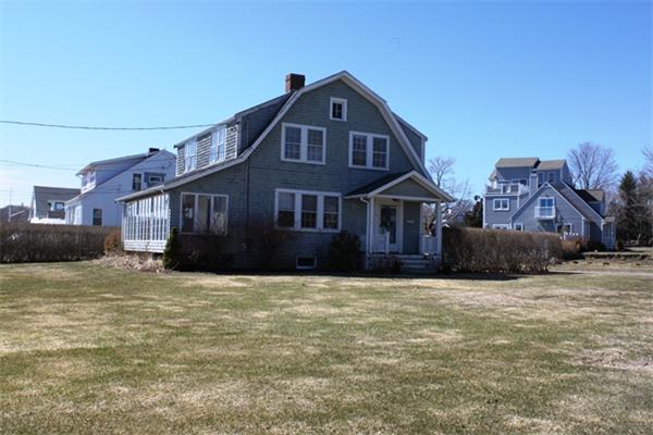 75 Jericho Road Scituate, MA 02066 - Photo 1 of 19 a front view of a house with a yard