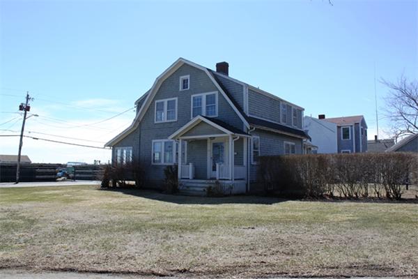 75 Jericho Road Scituate, MA 02066 - Photo 2 of 19 a front view of a house with a yard