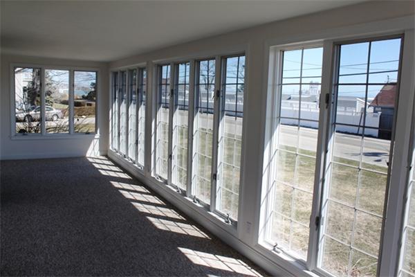 75 Jericho Road Scituate, MA 02066 - Photo 3 of 19 a view of a glass door and deck