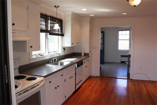 75 Jericho Road Scituate, MA 02066 - Photo 5 of 19 a kitchen with granite countertop a sink and a stove top oven