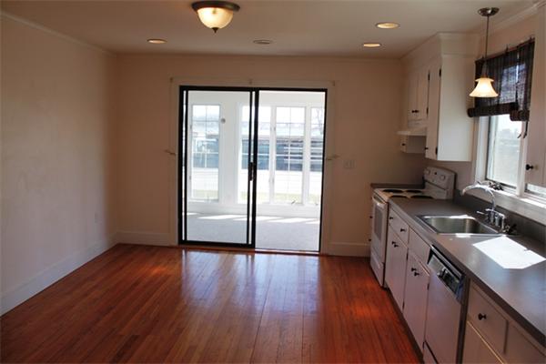 75 Jericho Road Scituate, MA 02066 - Photo 6 of 19 a kitchen with stainless steel appliances granite countertop a stove a sink and a large window