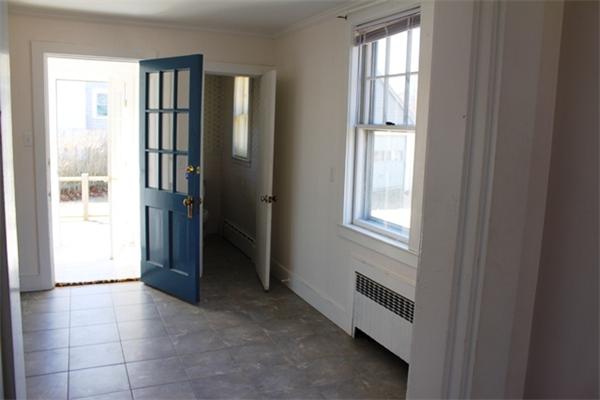 75 Jericho Road Scituate, MA 02066 - Photo 10 of 19 a view of an entryway with a livingroom