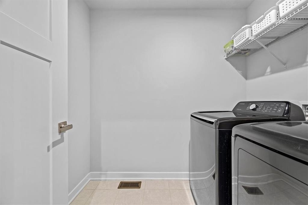 718 Celia Way Harmony, PA 16037 - Photo 16 of 23 a utility room with dryer and washer