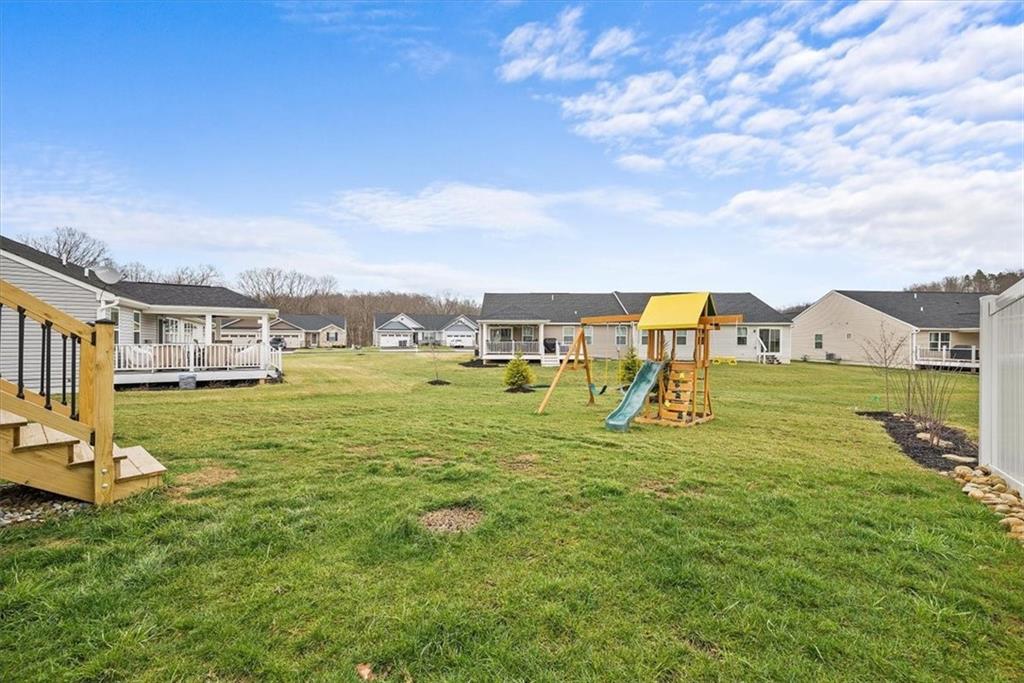 718 Celia Way Harmony, PA 16037 - Photo 17 of 23 a view of a house with a big yard