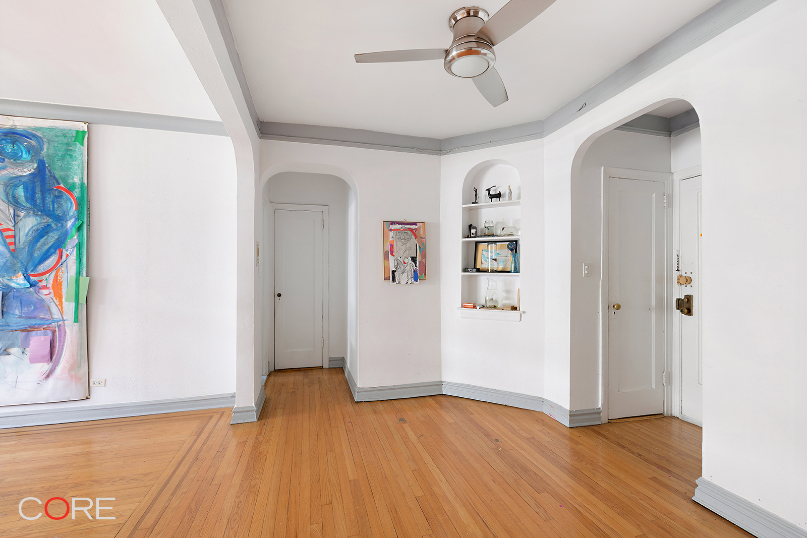 34-24 82nd Street, Unit 4N Queens, NY 11372 - Photo 3 of 10 a view of an entryway with wooden floor