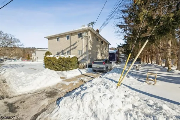 a view of a backyard of the house