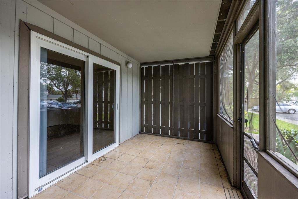 6519 West Newberry Road, Unit 704 Gainesville, FL 32607 - Photo 24 of 28 Screened in Porch