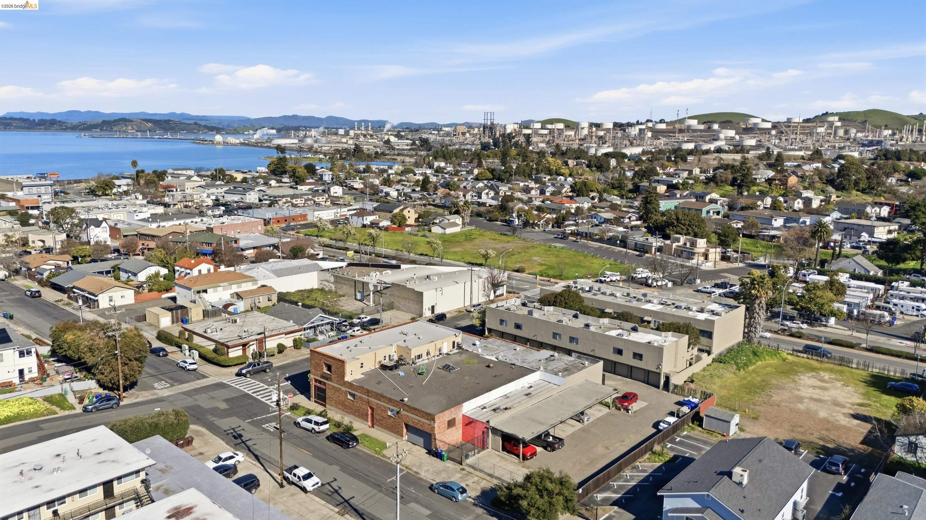 511 Third Street Rodeo, CA 94572 - Photo 11 of 25 an aerial view of a city with lots of residential buildings