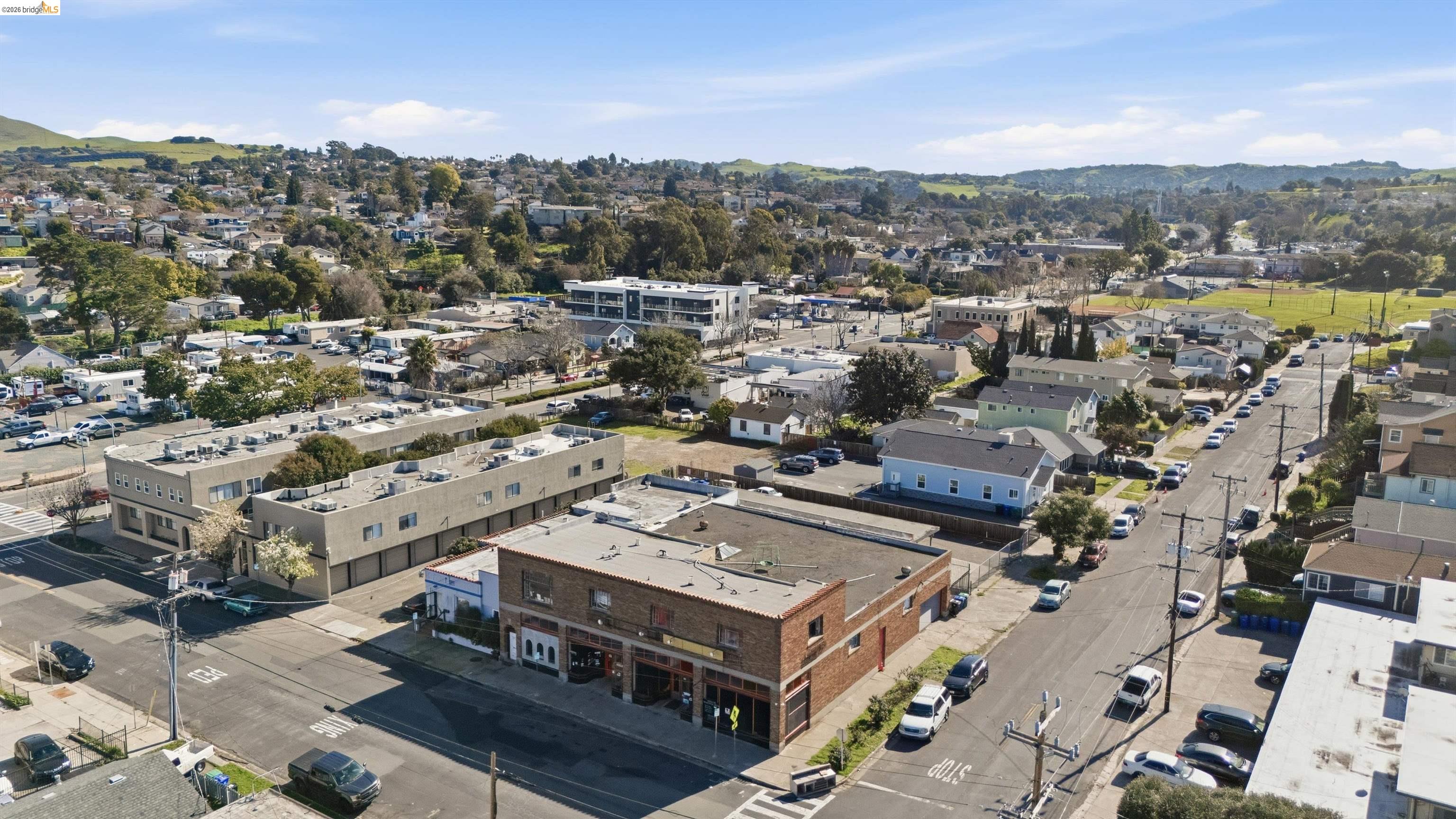 511 Third Street Rodeo, CA 94572 - Photo 9 of 25 an aerial view of a city with lots of residential buildings