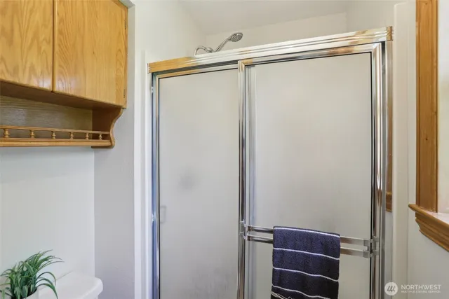 a view of walk in closet with window