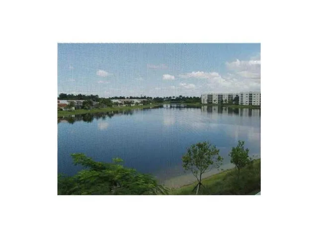 a view of a lake with a outdoor space