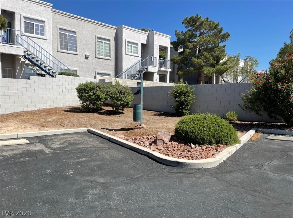 2201 Ramsgate Drive, Unit 915 Henderson, NV 89074 - Photo 7 of 36 Discover apartment living with private balconies and mature landscaping.