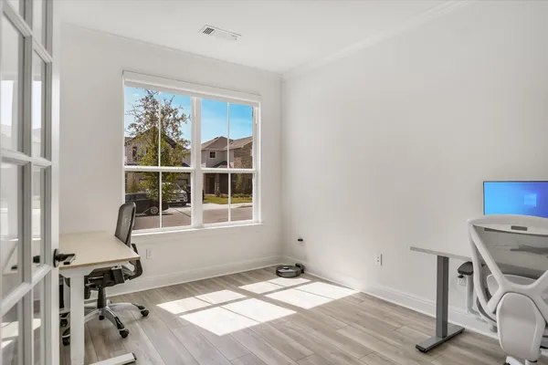 a view of an empty room and window
