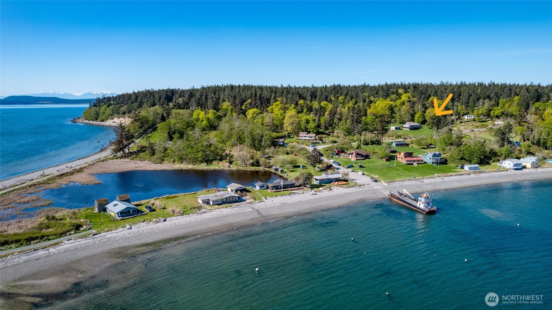 0 Davis Beach Road Anacortes, WA 98221 - Photo 10 of 22 an aerial view of a house with a garden and houses