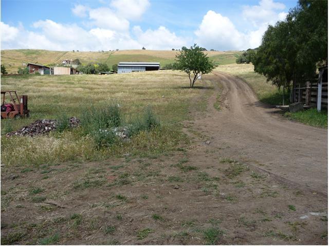 Undisclosed Address San Jose, CA 95148 - Photo 2 of 4 a view of a dry yard with wooden fence