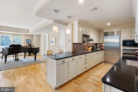 a large kitchen with cabinets