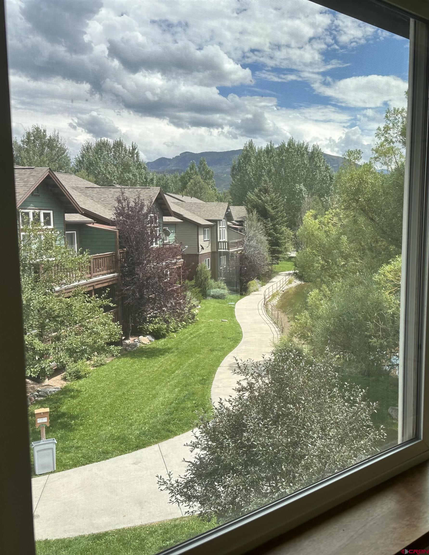 550 Redcliff Circle, Unit D202 Ridgway, CO 81432 - Photo 26 of 29 a view of a garden from a balcony