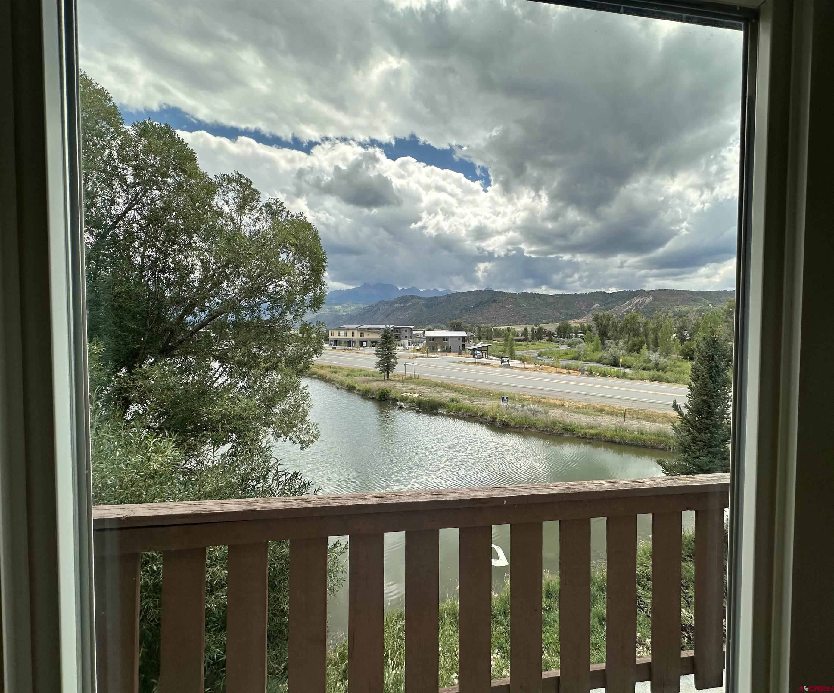 550 Redcliff Circle, Unit D202 Ridgway, CO 81432 - Photo 27 of 29 a view of a garden from a balcony
