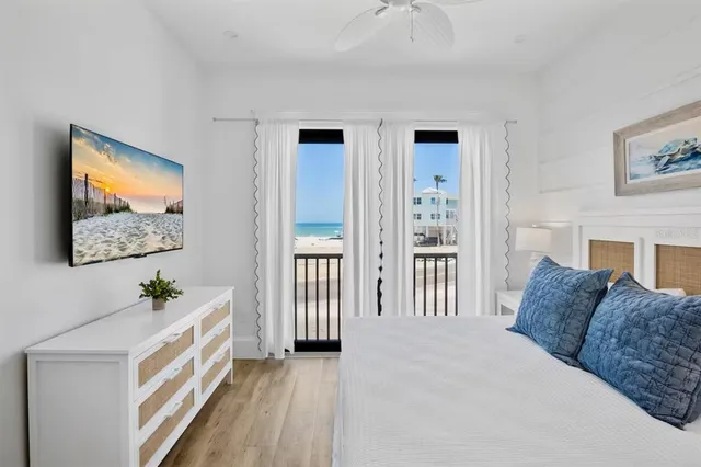 a view of a livingroom with furniture and a fireplace