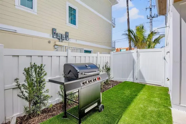 a view of a chairs and table on the terrace