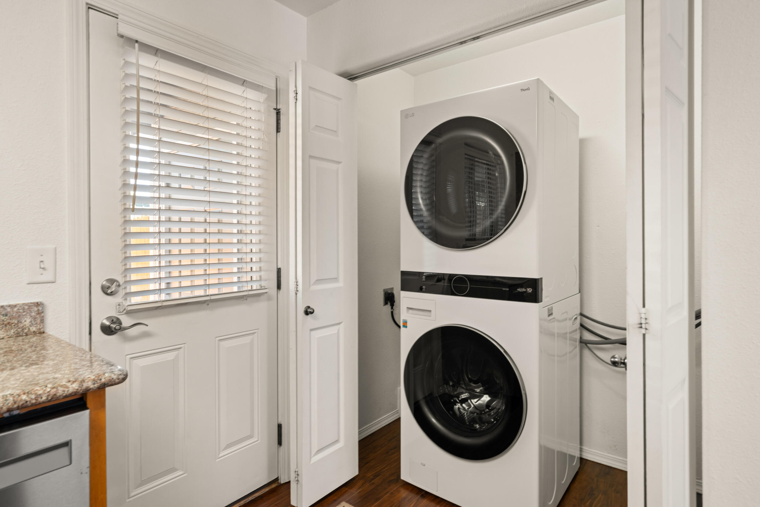 450 Midway Road, Unit 33 Medford, OR 97501 - Photo 19 of 21 a view of a hallway with washer and dryer
