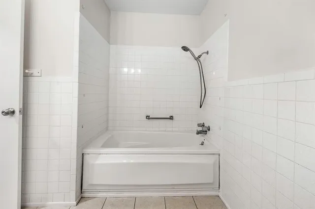a bathroom with a bathtub