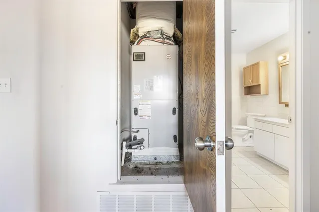 a bathroom with a granite countertop shower mirror and a sink