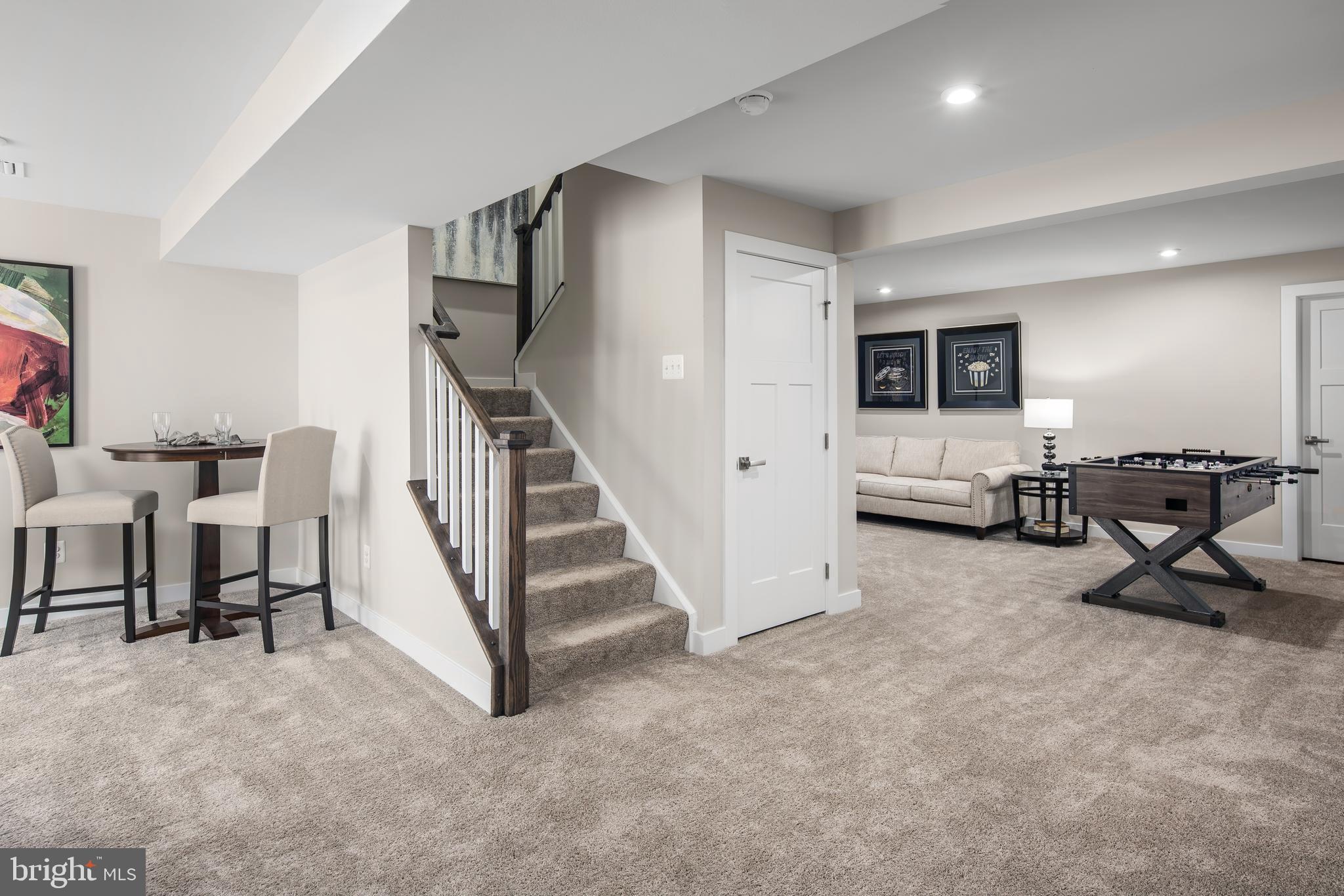 52 Wallace Way Ranson, WV 25438 - Photo 3 of 18 a view of a livingroom with entryway and workspace